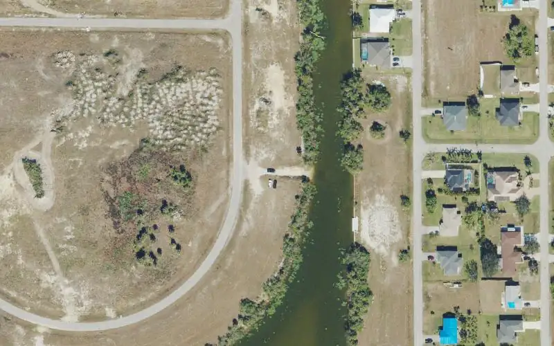 Aerial photo of the area around City of Cape Coral - Primitive Boat Ramp - 2119 NE 12th Avenue, Lee County