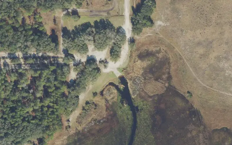 Aerial photo of the area around Watermelon Pond (Water Level Can Often Be Too Low For Boating), Alachua County